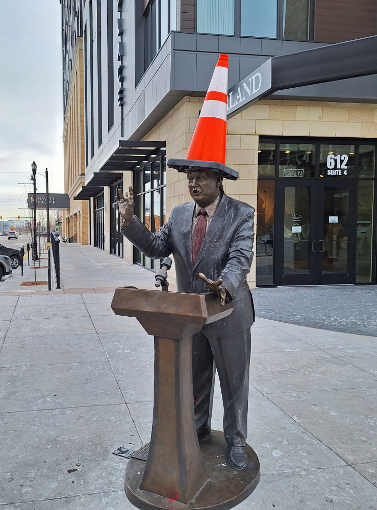 Trump statue with traffice cone